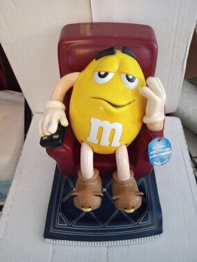 M & M collectibles Yellow Watching TV dispenser